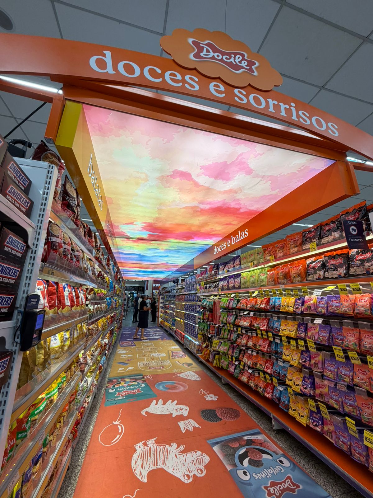 Docile - Corredor Lopes Supermercado